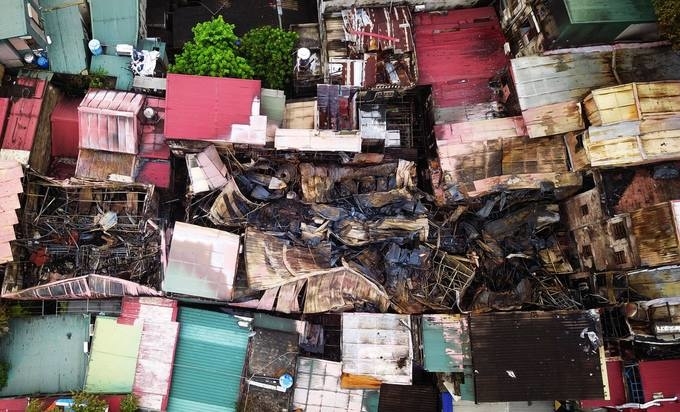 Two charred bodies found in Hanoi blaze wreckage