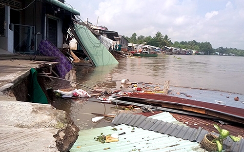 Erosion swallows five houses in Vietnam’s Mekong Delta