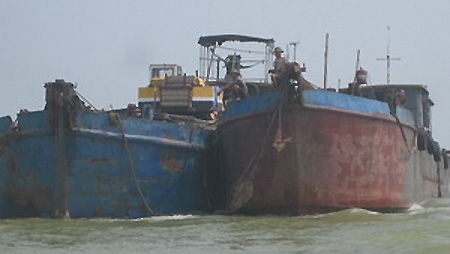 Routine dredging work uncovers sunken ship