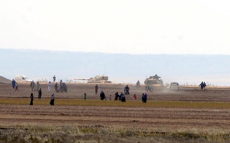 Turkish tanks roll into Syria, opening new line of attack