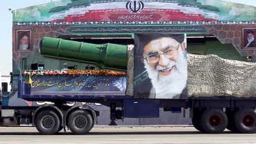 Iran pledges to ramp up missile program, in challenge for Obama