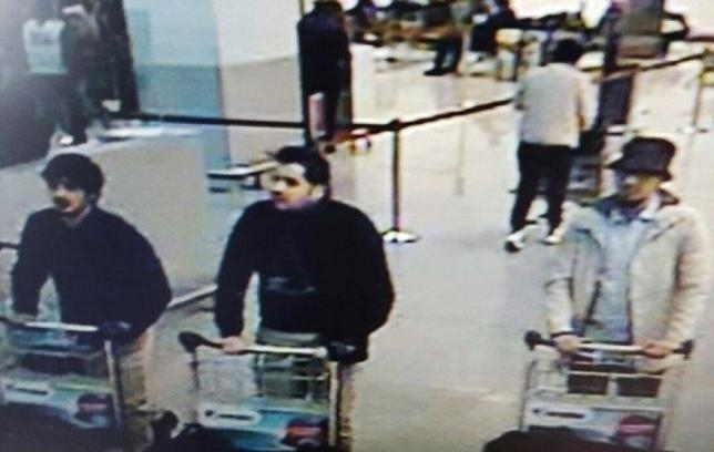 Belgium charges airport suspect, calls off Brussels 'march against fear'