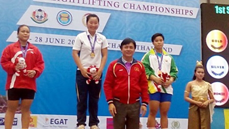 Tham wins weightlifting gold