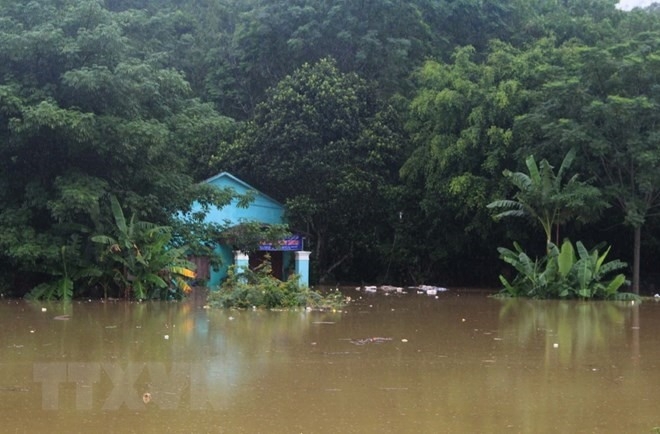 Typhoon Bebinca weakens, but leaves villages submerged in water