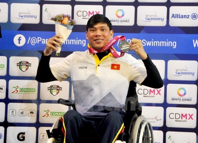 Tùng wins silver medal at world champs