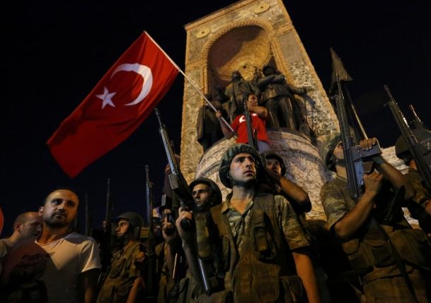 Turkey troops say they seize power; crowds answer Erdogan call to defy them