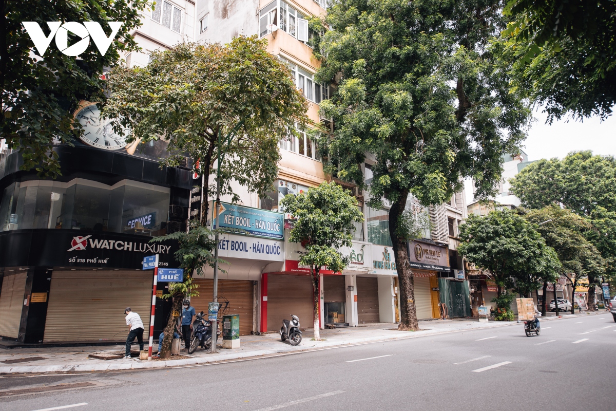 pho buon ban tai ha noi van im lim cho ngay mo cua tro lai hinh anh 18