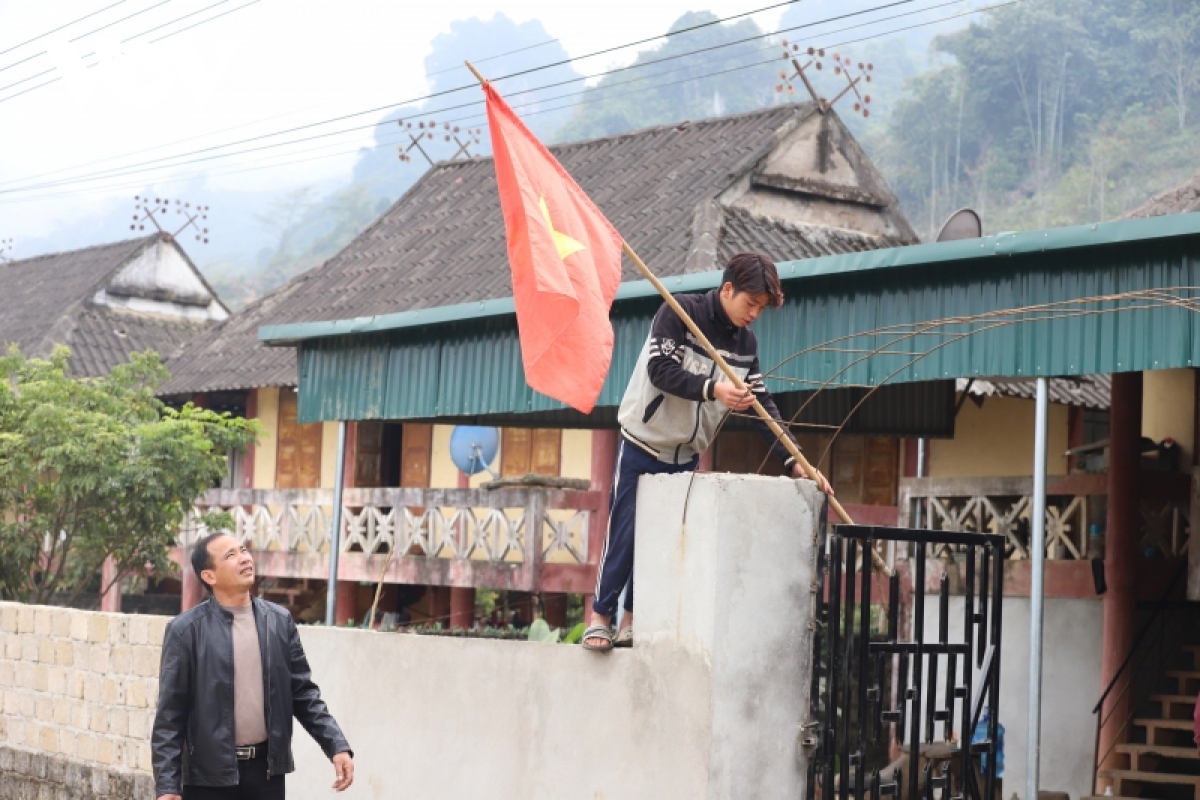 san xuat thang loi, nguoi dan tai dinh cu tan lap ho hoi don tet hinh anh 2