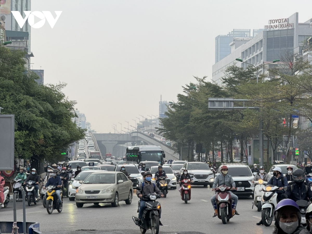 ngay dau tien di lam cua nam moi, duong pho ha noi thong thoang la thuong hinh anh 4