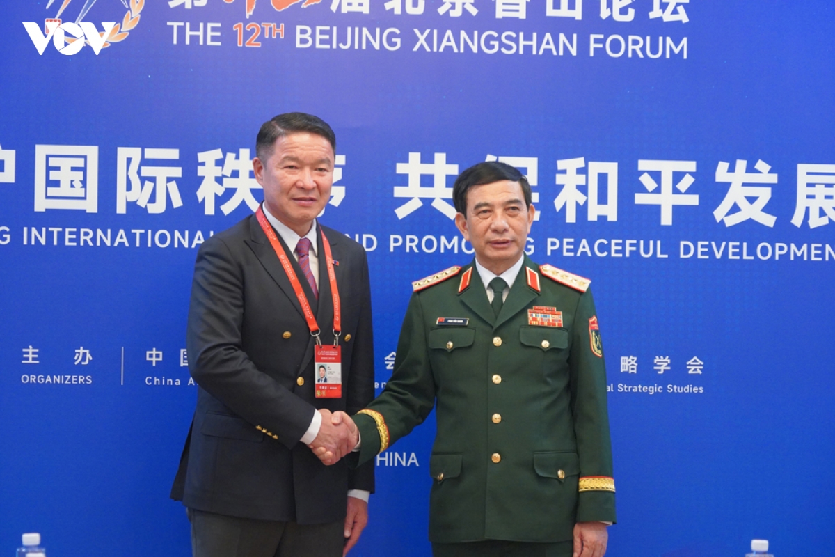 Dai tuong phan van giang gap go va tiep xuc ben le dien dan huong son bac kinh lan thu 12 hinh anh 5