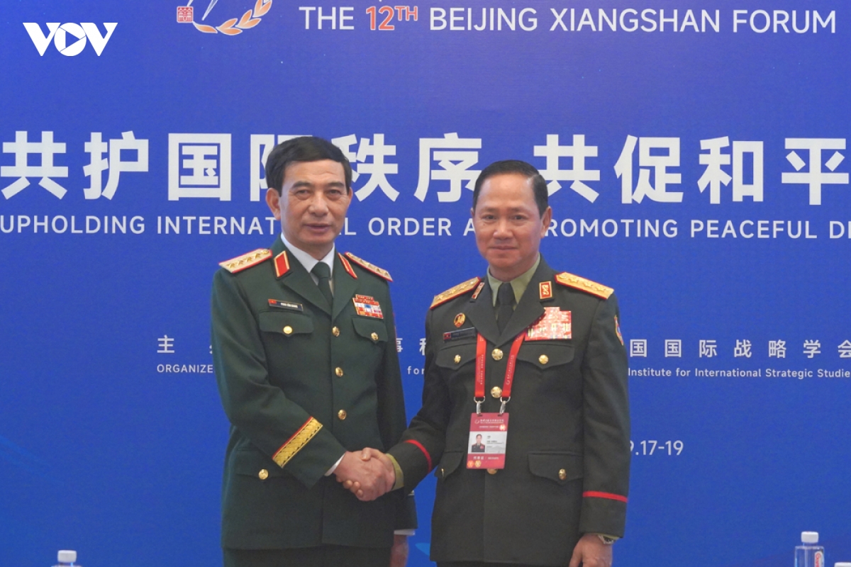 Dai tuong phan van giang gap go va tiep xuc ben le dien dan huong son bac kinh lan thu 12 hinh anh 6