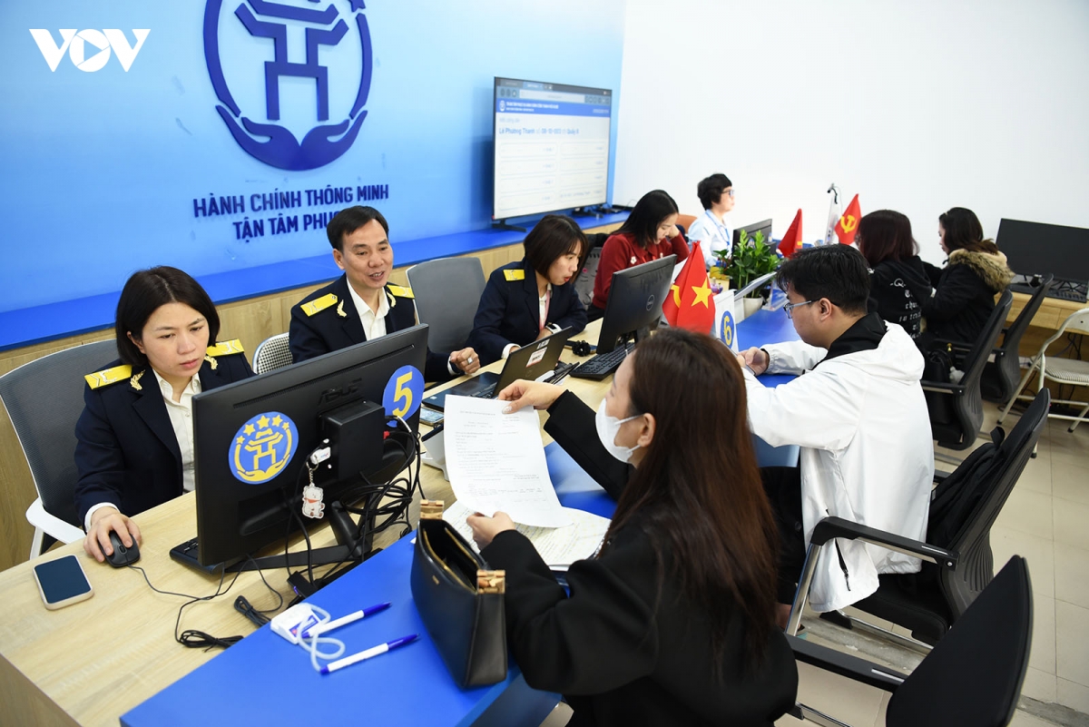 cac co quan cong so ha noi nghiem tuc lam viec ngay dau nam moi hinh anh 1