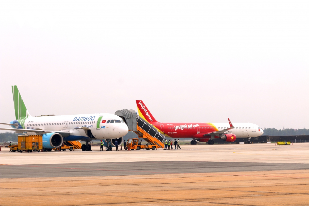 du lich, hang khong no luc tim cach thich ung truoc cu soc kep hinh anh 1