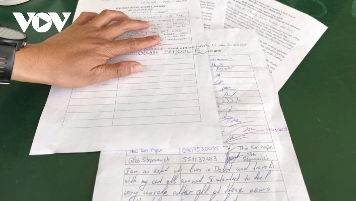 nguoi phu nu bat luc xua duoi ke trom cho ban chet thu cung o Da lat hinh anh 2