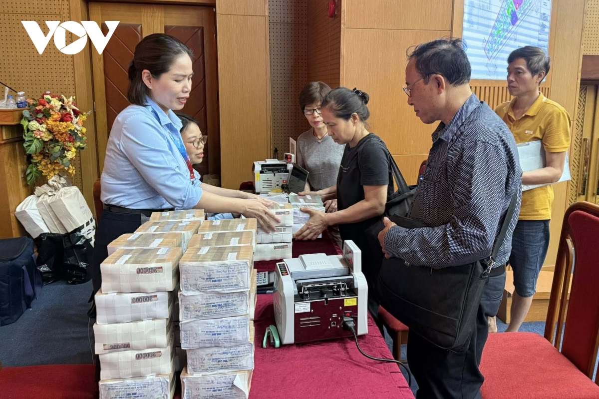 nguoi dan dong loat nhan tien, ban giao mat bang cho du an duong vanh dai 2,5 hinh anh 13