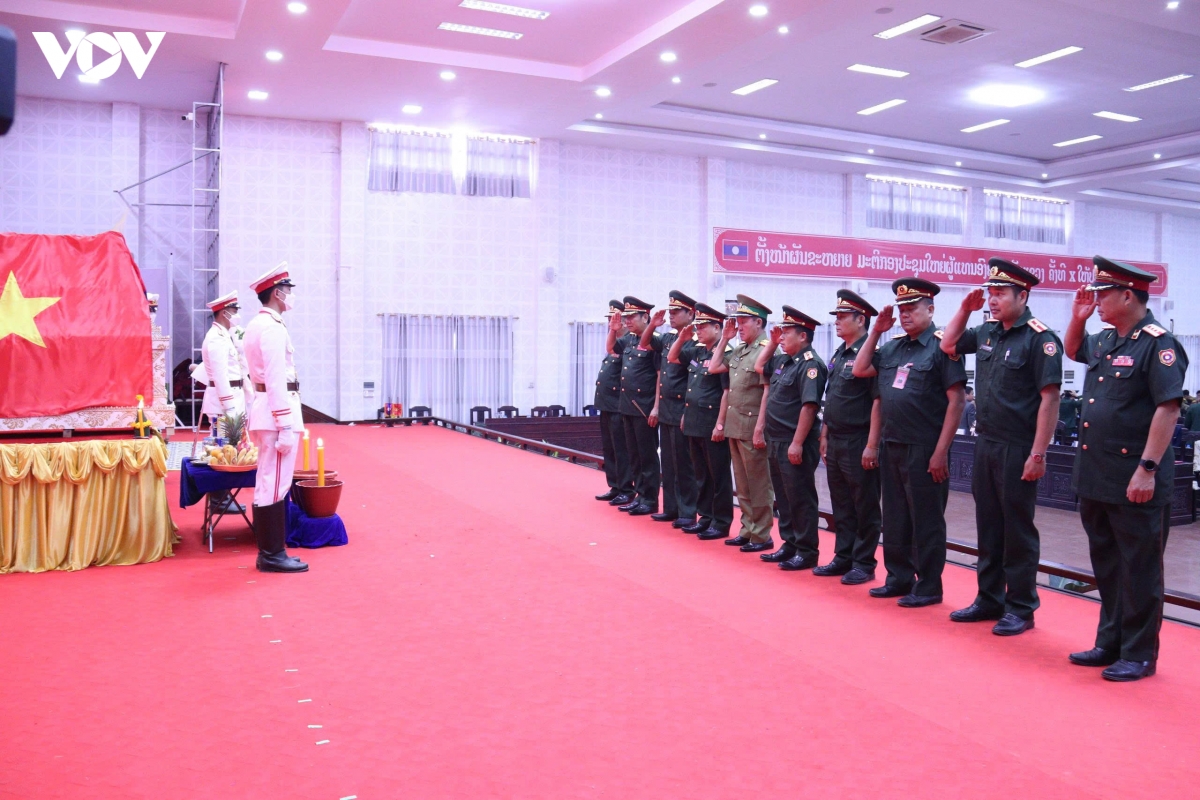 Dua 9 liet si quan tinh nguyen viet nam hy sinh tai lao tro ve dat me hinh anh 2