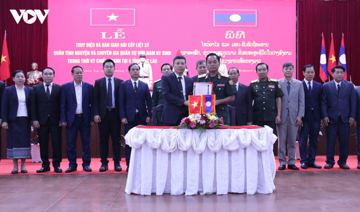 Dua 9 liet si quan tinh nguyen viet nam hy sinh tai lao tro ve dat me hinh anh 4