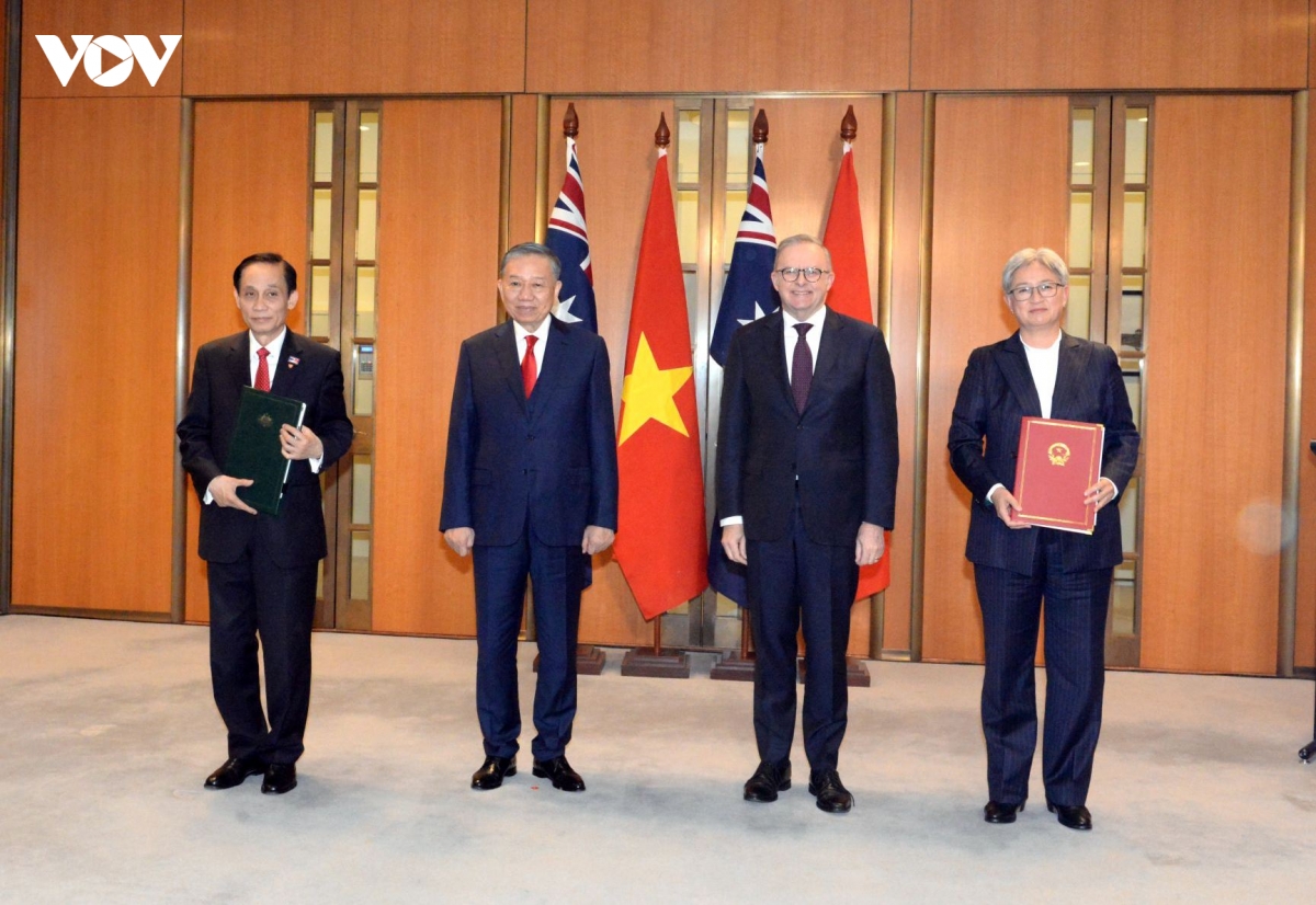 tong bi thu, chu tich nuoc chung kien trao van kien hop tac viet nam - australia hinh anh 2