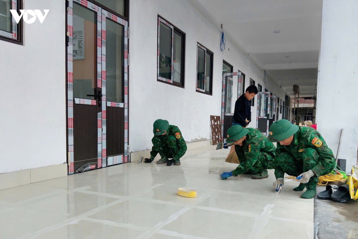 mau xanh ao linh tren nhung ngoi truong trong mo o lao cai hinh anh 9