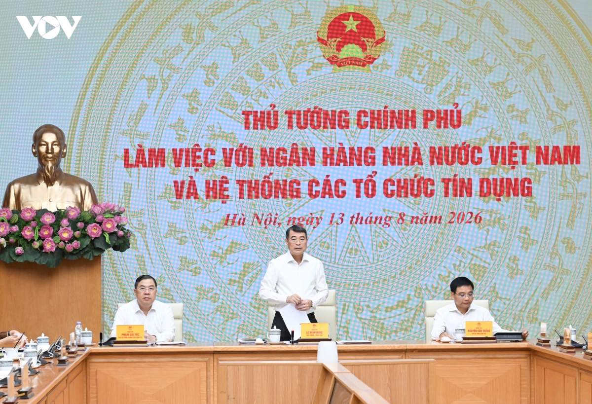 thu tuong chinh phu le minh hung lam viec voi ngan hang nha nuoc viet nam hinh anh 2