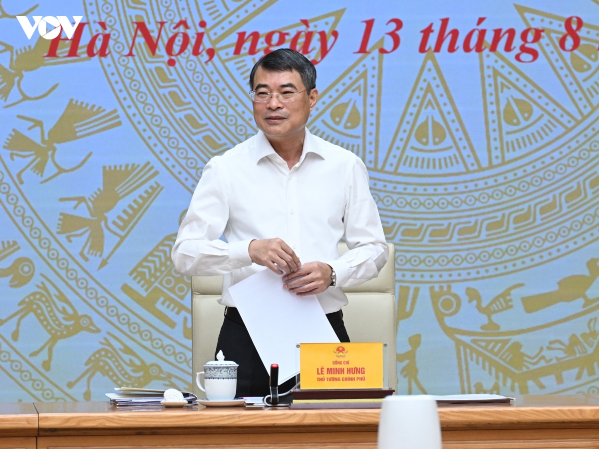 thu tuong chinh phu le minh hung lam viec voi ngan hang nha nuoc viet nam hinh anh 1