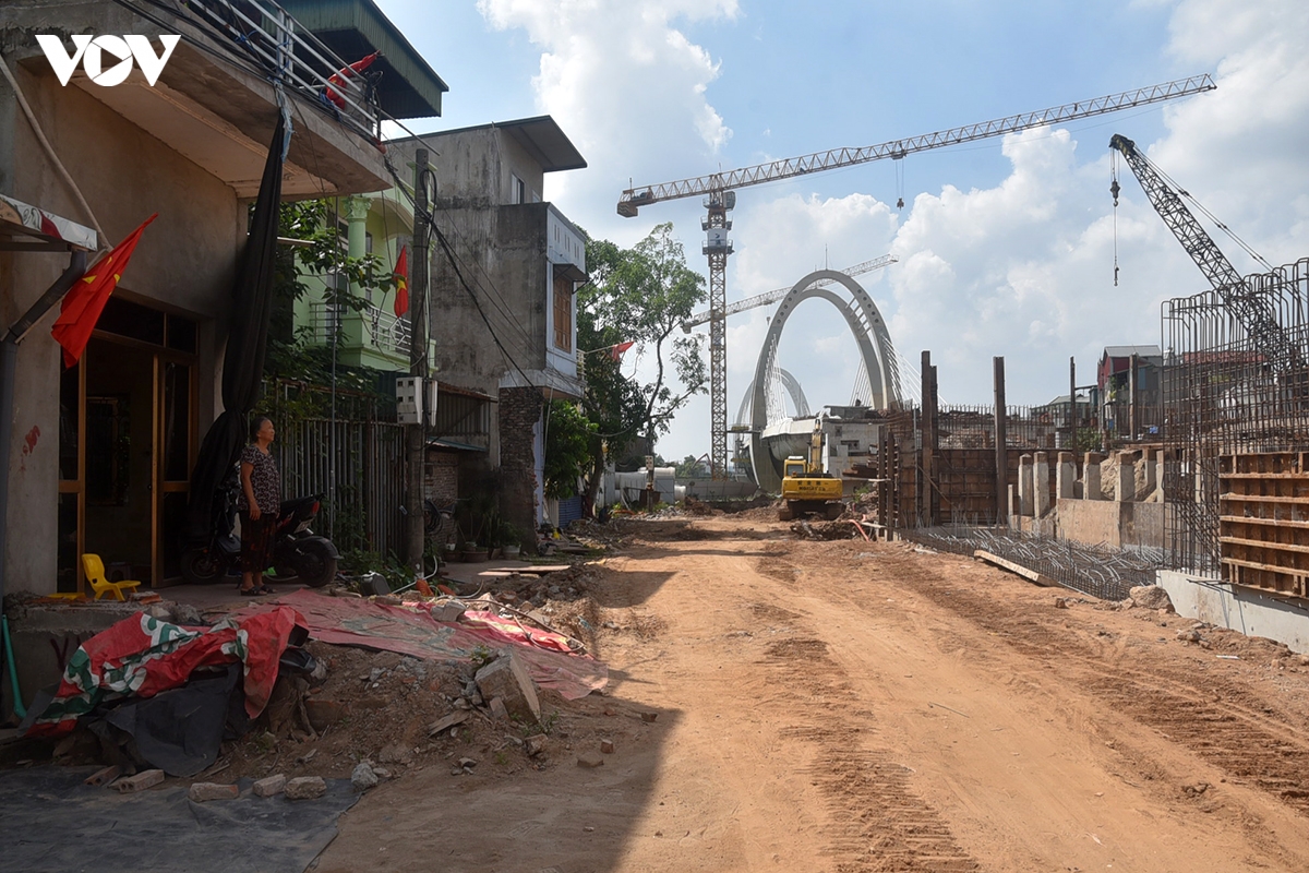 thi cong cau Duong moi, nguoi dan mong som thoat canh ngap ung, bui bam hinh anh 7