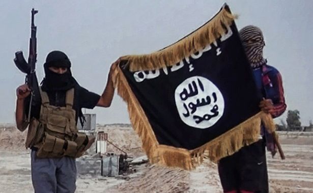 2014_10_14_militants_of_the_islamic_state_posing_with_the_jihadists_flag_rsz_crp_bdgo.jpg