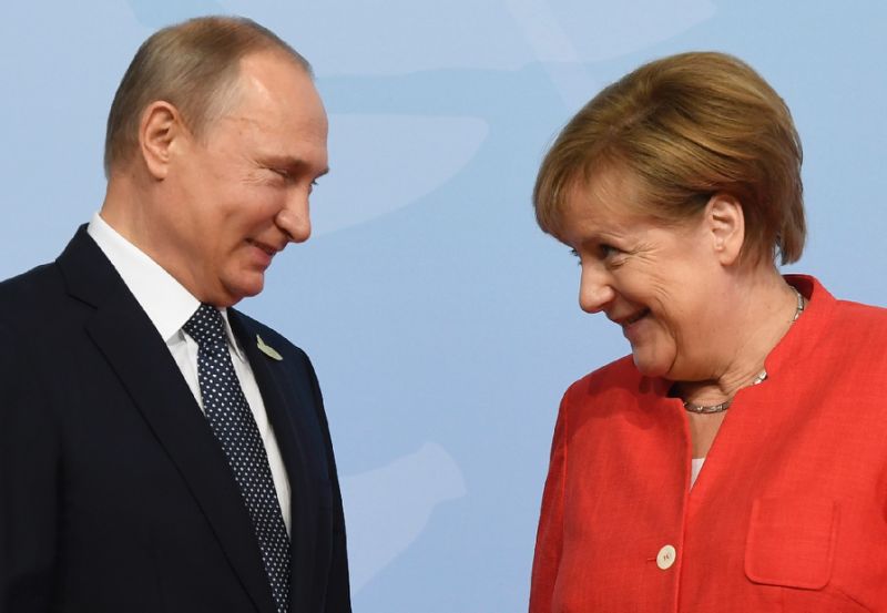 putin_merkel_afp_axqv.jpg